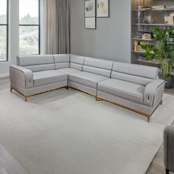 Taxzek Modern L-Shaped Sectional Sofa with Ottoman, Quilted Grey Leather, Gold Trim, Light Blue Accent Pillows - Image 2