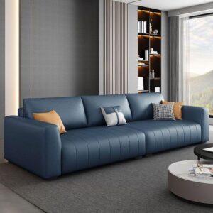 modern 4 seater sofa | navy blue leatherette | linear tufted | 3 back pillows | plastic black legs | living room couch.